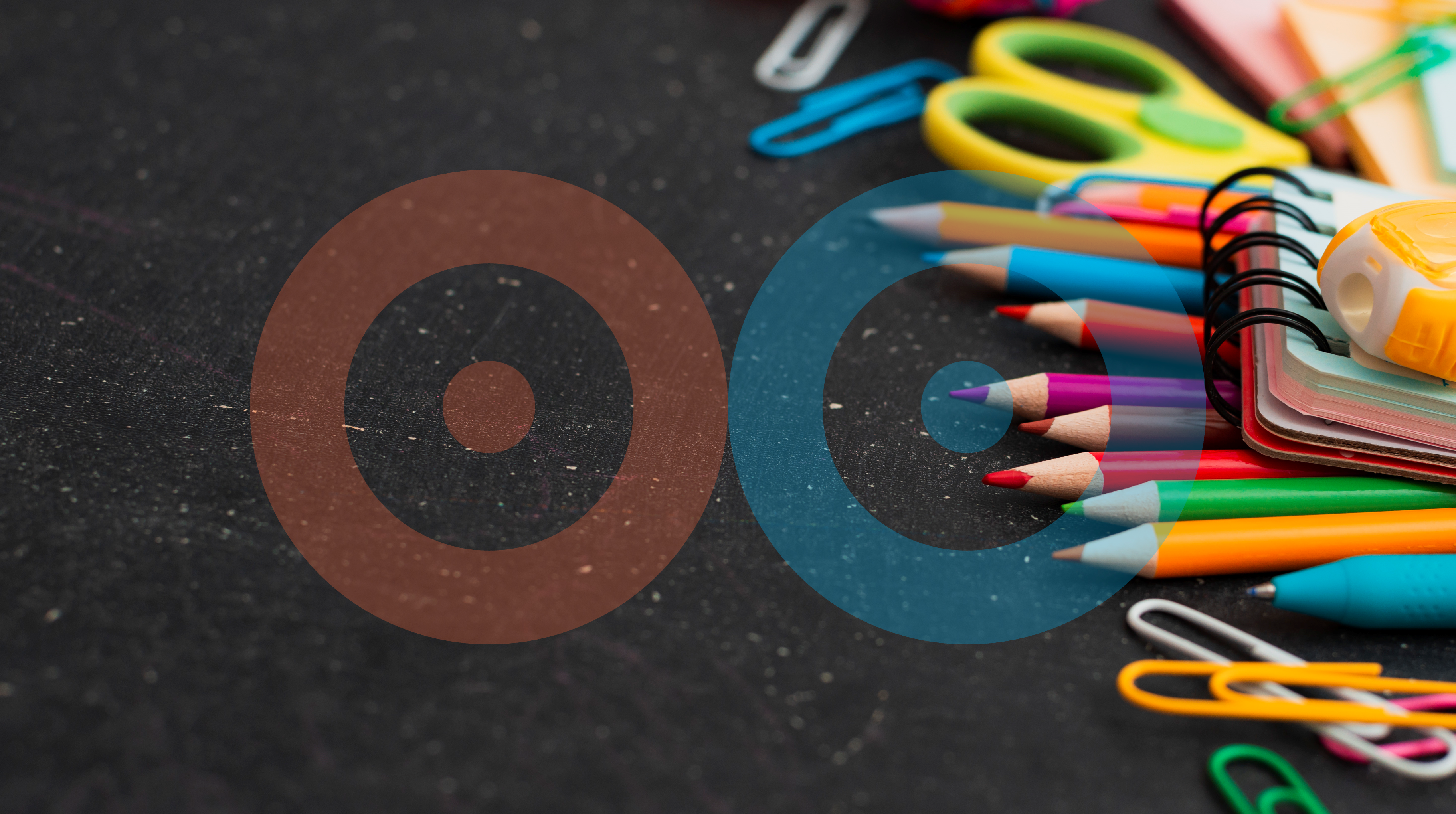 School supplies on a black background with a logo in the center