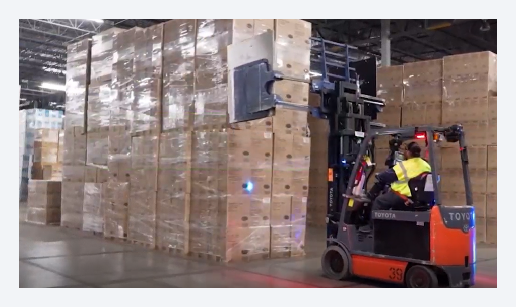 Operator performing quality inspection on packaging components 