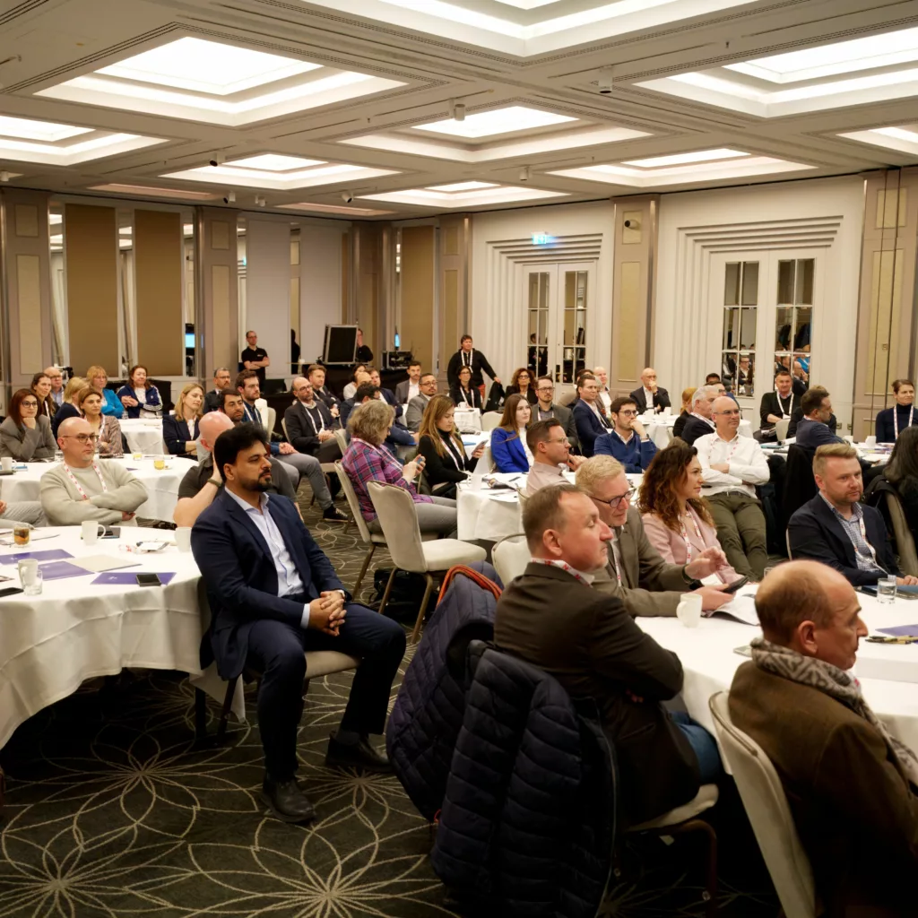 Room filled with executives in a conference Impressionen vom OPEX Summit 2025