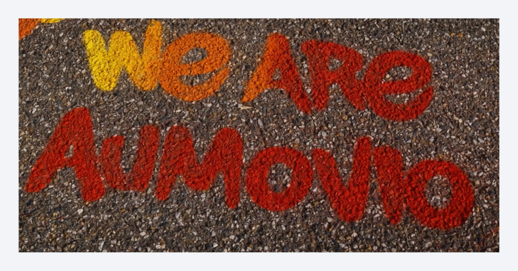  &ldquo;We are Aumovio&rdquo; painted on the floor
