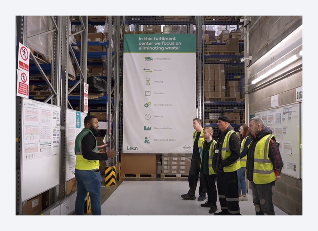 Team meeting in warehouse
